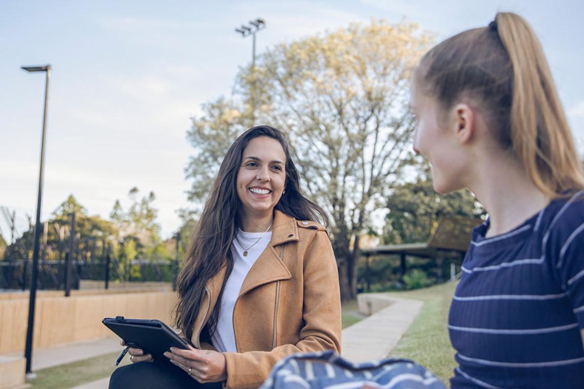 Two students having a conversation